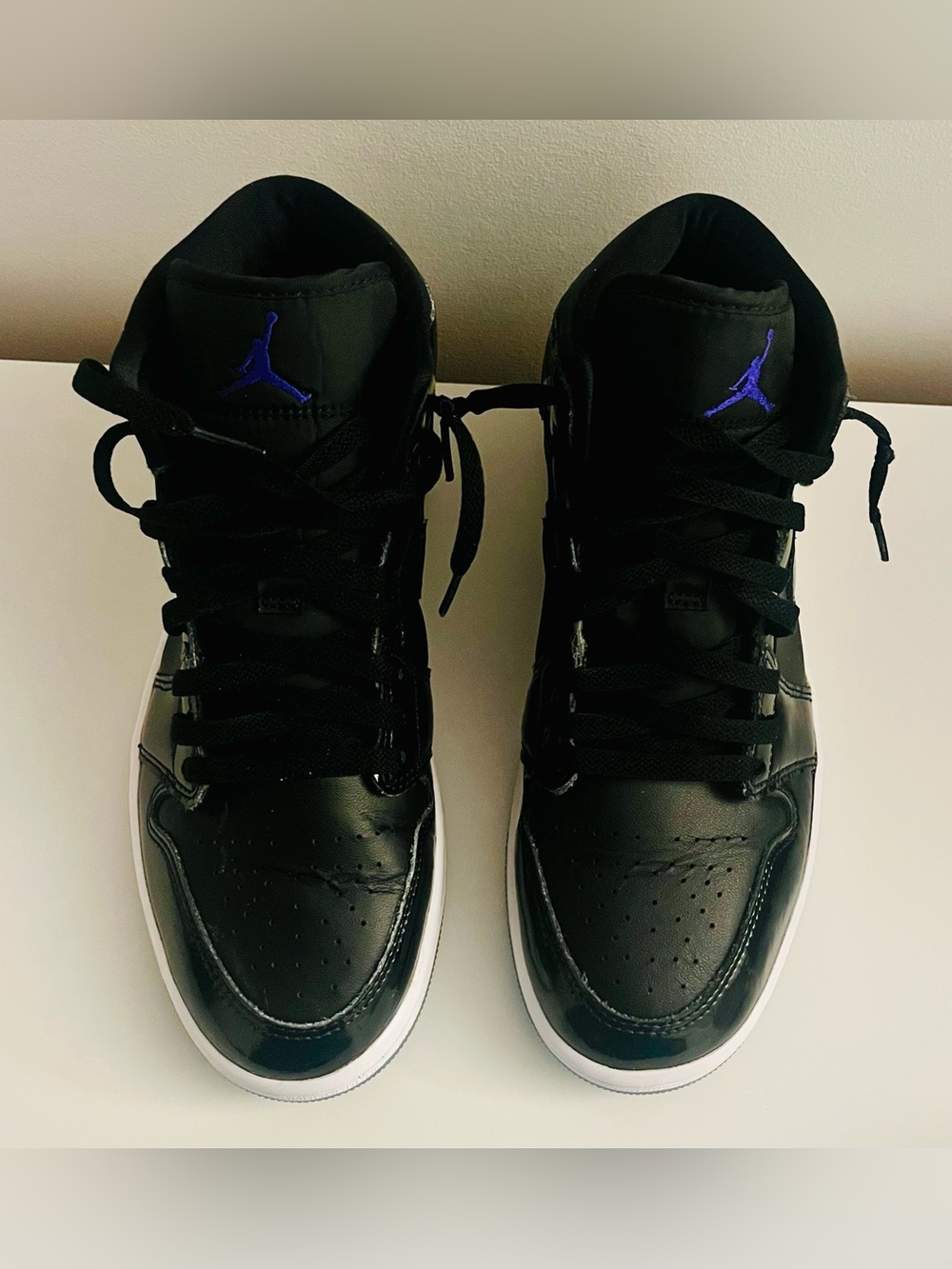 Jordan Black High-Top Sneakers with Purple Jumpman Accent